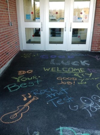 motivational sayings written in chalk on sidewalk