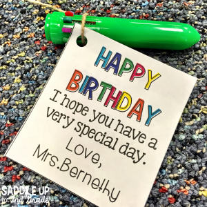 multi colored pen with a happy birthday note