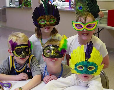 students with festive masks on