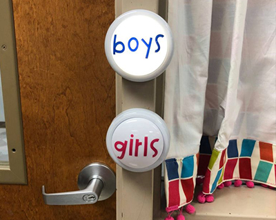 battery operated light indicating a student is in the bathroom when turned on