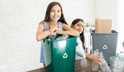Students learning to recycle